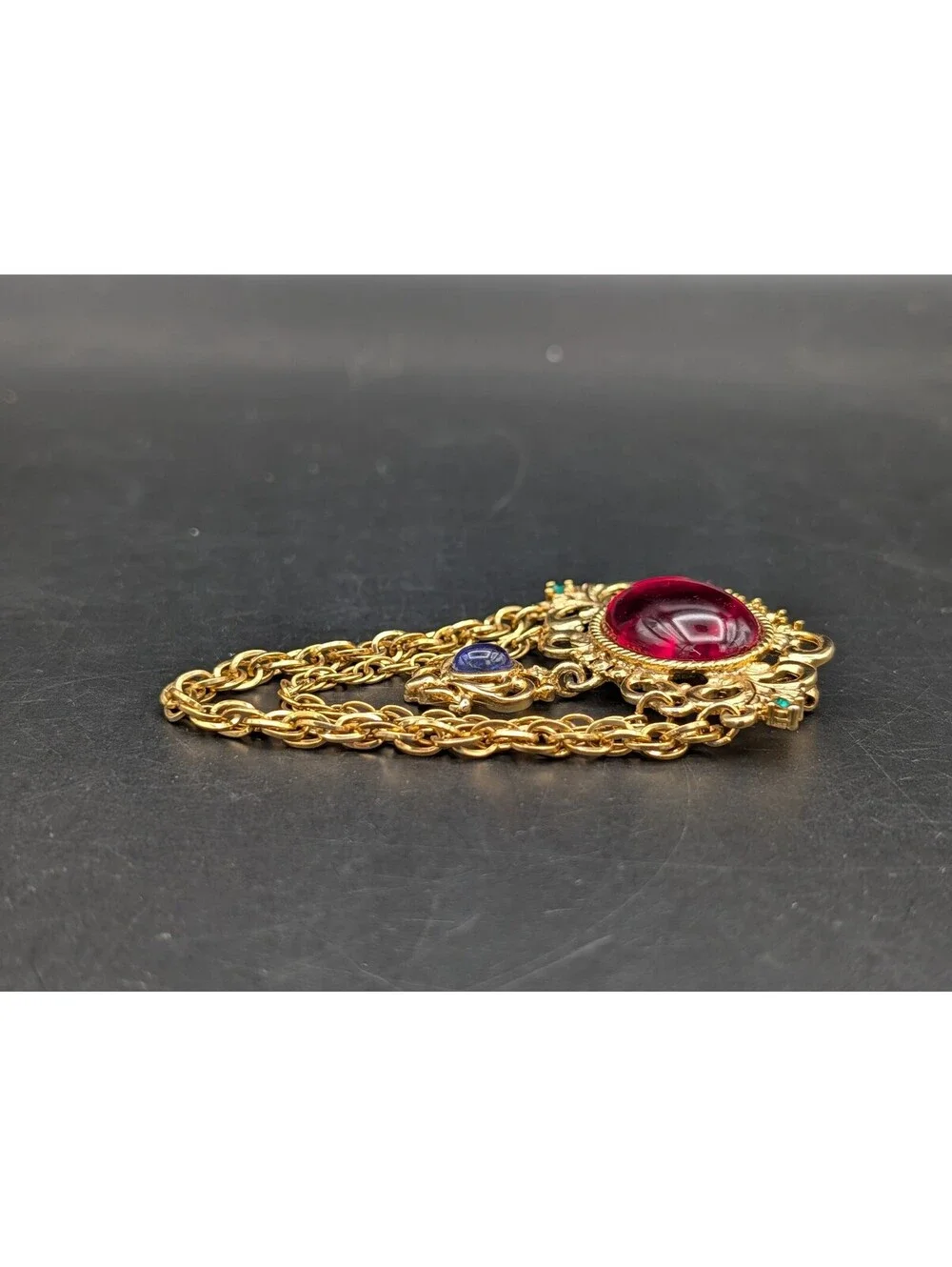 Vintage 1980s Regal Brooch Ruby Red Blue Glass Cabochon Draped Chain Pin